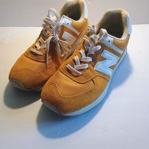 New Balance Orange and White Sneakers